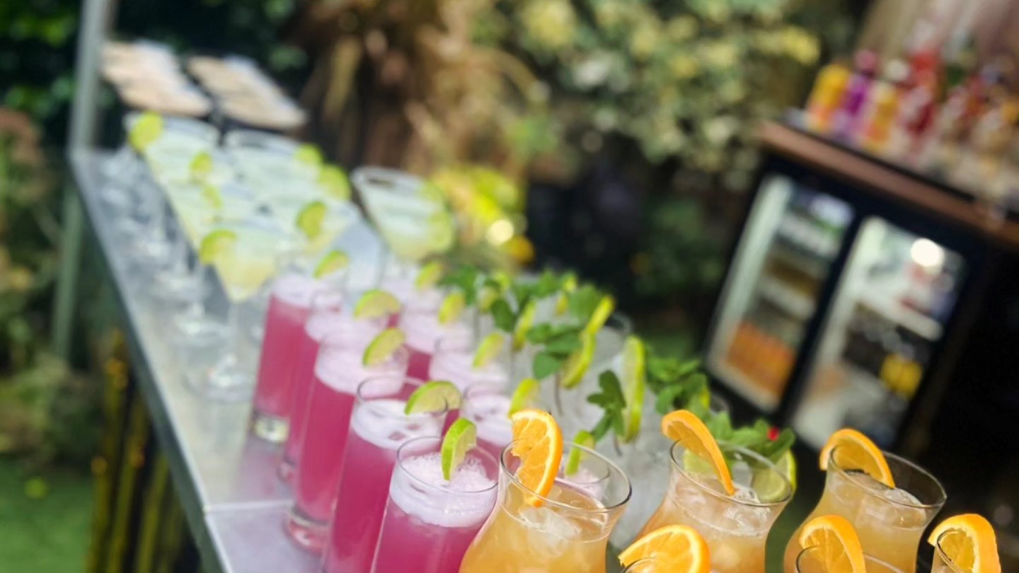 Colourful cocktails prepared by a mobile bar hire service in London