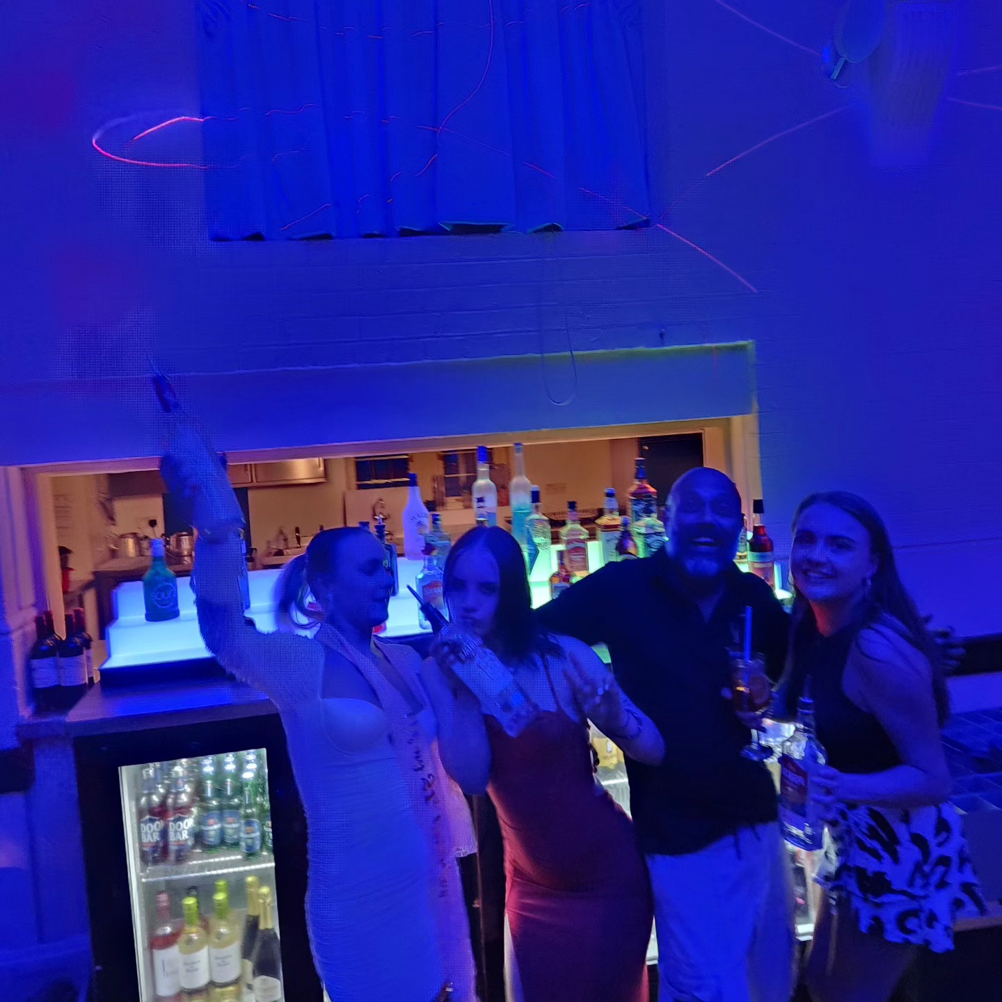Mobile bar hire in Central London at a venue with blue lighting